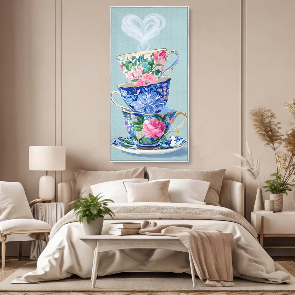 Tablou canvas cu pictura cu stiva de cesti de ceai, in rama de aluminiu argintiu, pe perete intr-un dormitor